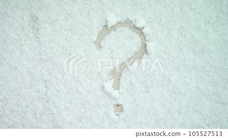 Question mark painted on white snow closeup Question mark painted on white snow closeup 105527513
