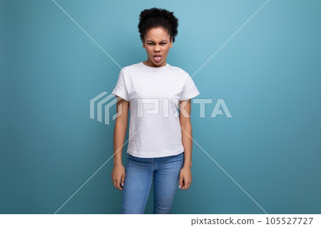 portrait of authentic beautiful young brunette hispanic woman in white t-shirt on background with portrait of authentic beautiful young brunette hispanic woman in white t-shirt on background with 105527727