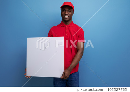 young american man dressed in a baseball cap and t-shirt uniform reporting the news on a poster young american man dressed in a baseball cap and t-shirt uniform reporting the news on a poster 105527765