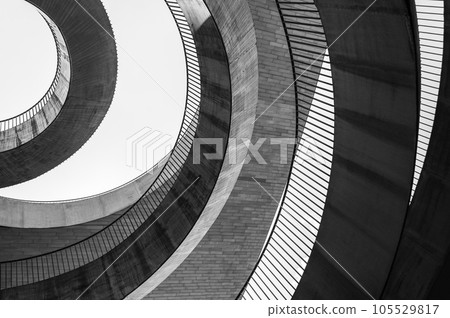 Geometric abstraction in the form of chaotic semicircles and arcs of different textures and from different materials. Black and white photo Geometric abstraction in the form of chaotic semicircles and arcs of different textures and from different materials. Black and white photo 105529817