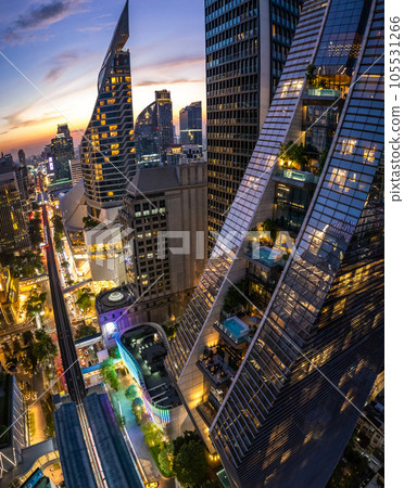Aerial view of Ploenchit road by night in Bangkok Downtown, financial district and business center Aerial view of Ploenchit road by night in Bangkok Downtown, financial district and business center 105531266