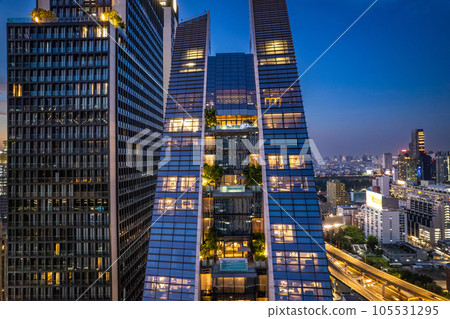 Aerial view of Ploenchit road by night in Bangkok Downtown, financial district and business center Aerial view of Ploenchit road by night in Bangkok Downtown, financial district and business center 105531295