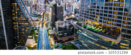 Aerial view of Ploenchit road by night in Bangkok Downtown, financial district and business center Aerial view of Ploenchit road by night in Bangkok Downtown, financial district and business center 105531299