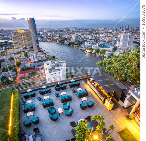 Aerial view of rooftop bar in Khlong San and Chao Phraya river in Bangkok, Thailand Aerial view of rooftop bar in Khlong San and Chao Phraya river in Bangkok, Thailand 105531679