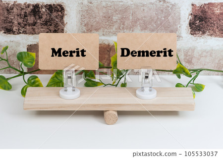 Merit and demerit on the seesaw Merit and demerit on the seesaw 105533037