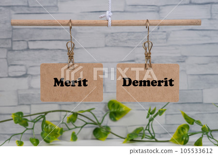 Merit and demerit hanging on the balance 105533612