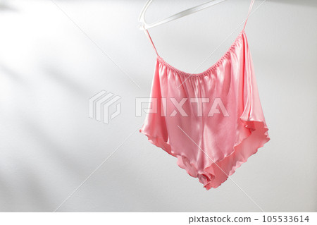 Pink satin women's pajama pants. Pink satin women's pajama pants. 105533614