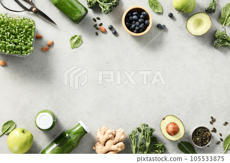 Vegetarian vegan healthy ingredients and green smoothie on grey stone background 105533875