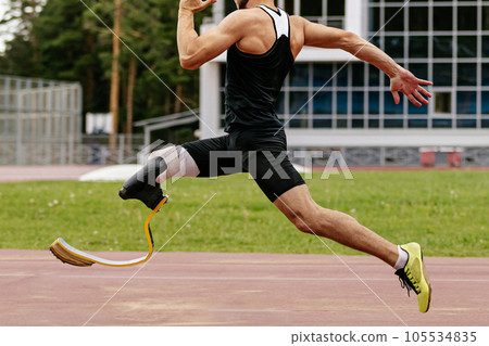 athlete disability runner running sprint race in athletics, sports summer games athlete disability runner running sprint race in athletics, sports summer games 105534835