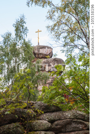 Golden cross mounted on the top of the Mount Tserkovka 105538196