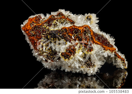 Macro mineral stone crystals Hemimorphite rock on a black background 105538483