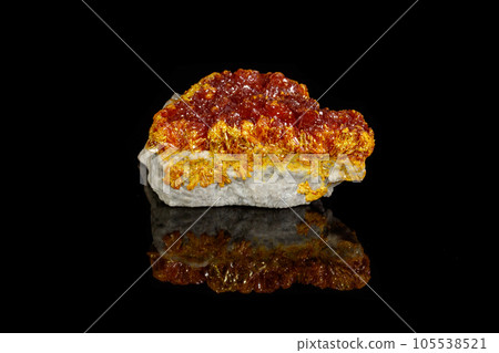 Macro Mineral Stone Orpiment on Black Background 105538521