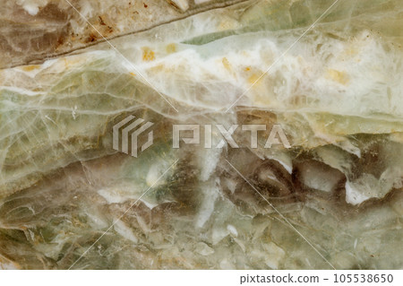macro stone Fluorite mineral on a black background 105538650