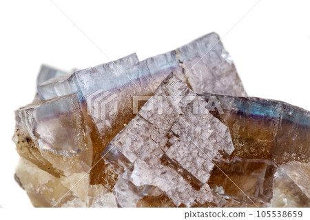 Macro mineral stone yellow Fluorite on a white background Macro mineral stone yellow Fluorite on a white background 105538659