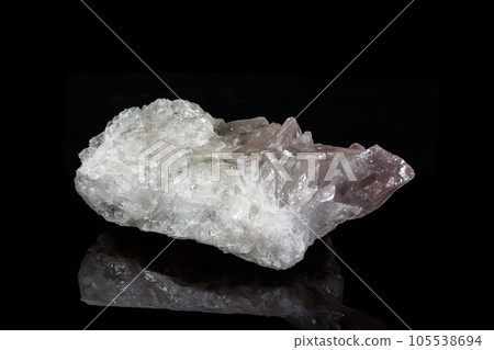 Macro mineral amethyst quartz stone on a black background 105538694