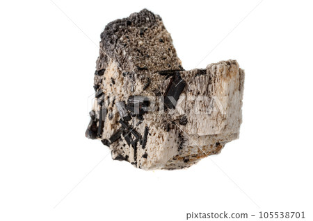 Macro mineral stone Schorl, Black Tourmaline on the feldspar on a white background Macro mineral stone Schorl, Black Tourmaline on the feldspar on a white background 105538701