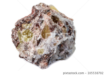 Macro mineral stone.Golden Apatite on a white background 105538702