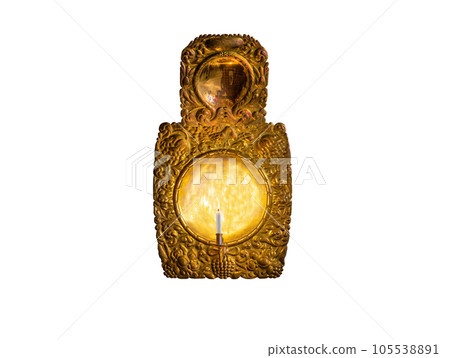 late embossed brass candle reflector 17th century isolated on white 105538891