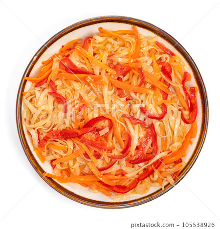 Udon noodles with chicken teriyaki, vegetables and sesame seeds. Asian cuisine. Dish on white background. Udon noodles with chicken teriyaki, vegetables and sesame seeds. Asian cuisine. Dish on white background. 105538926