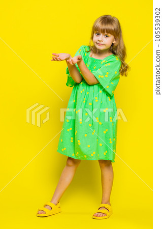 Child girl kid raising hands asking what why reason of failure, disbelief irritation by troubles Child girl kid raising hands asking what why reason of failure, disbelief irritation by troubles 105539302