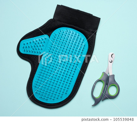 Animal nail scissors and a serrated glove for combing hair 105539848