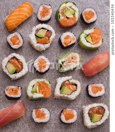 Overhead japanese sushi food. Maki ands rolls with tuna, salmon, shrimp, crab and avocado. Top view of assorted sushi, all you can eat menu. Rainbow sushi roll, uramaki, hosomaki and nigiri. 105540434
