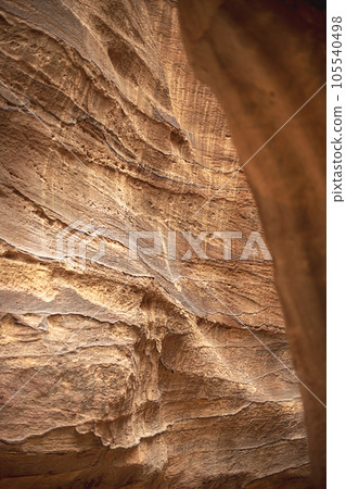 View of the canyon and the high, winding, mountain walls of the canyon. Petra, Jordan 105540498