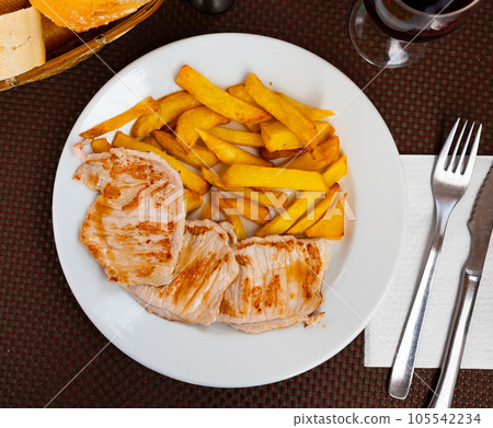 Appetising pork chop served with potato Appetising pork chop served with potato 105542234