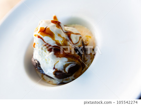 Chocolate brownie with ice cream Chocolate brownie with ice cream 105542274