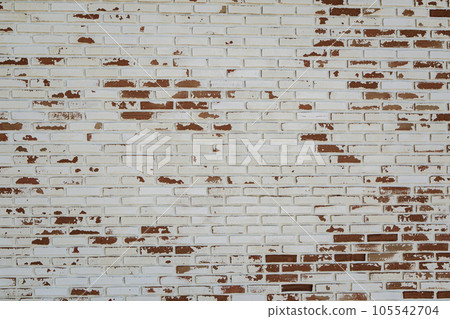 old white paint on red brick wall use as grounge background 105542704