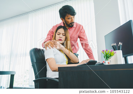 Boss or supervisor touching female employee's shoulder Causing young employees to resist because they are uncomfortable and afraid of being sexually abused. Concept of sexual harassment in the Boss or supervisor touching female employee's shoulder Causing young employees to resist because they are uncomfortable and afraid of being sexually abused. Concept of sexual harassment in the 105543122