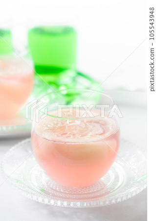 Summer snack time with handmade peach jelly and melon soda 105543948