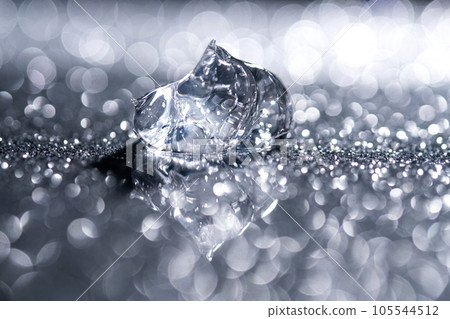 Transparent hyaluronic gel on a silver shiny background. 105544512