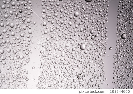 Drops of water on a transparent gray background. Drops of water on a transparent gray background. 105544660