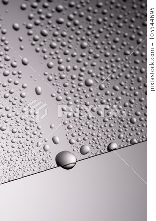 Drops of water on a transparent gray background. Drops of water on a transparent gray background. 105544695
