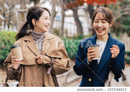 Two women going out 105546015