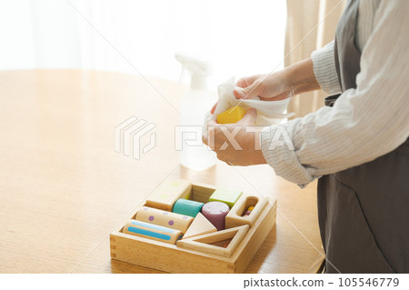 Hand photo of a woman who disinfects toys Hand photo of a woman who disinfects toys 105546779