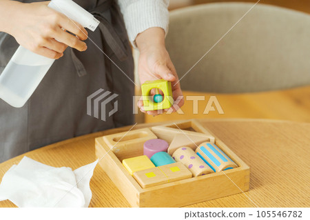 Hand photo of a woman who disinfects toys Hand photo of a woman who disinfects toys 105546782