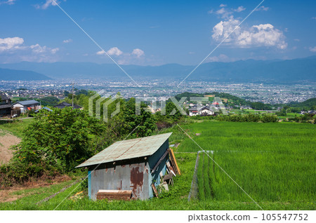 Nakano's terraced rice fields, summer rural scenery, Minami Alps City Nakano's terraced rice fields, summer rural scenery, Minami Alps City 105547752