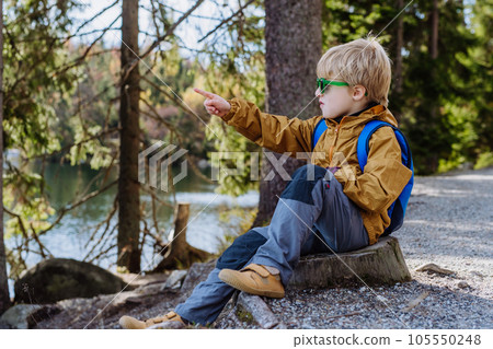 Portrait of little boy hiking in mountains. Portrait of little boy hiking in mountains. 105550248
