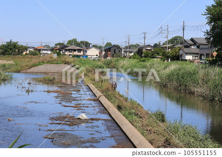 Scenery of Haraichi Numashitanoike Retention Reservoir swollen by heavy rain Scenery of Haraichi Numashitanoike Retention Reservoir swollen by heavy rain 105551155