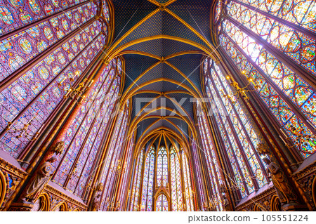 Monumental interior of Sainte-Chapelle with stained glass windows, upper level of royal chapel in the Gothic style. Palais de la Cite, Paris, France 105551224