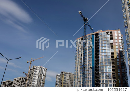 Tower cranes and unfinished buildings 105551617