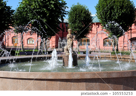 Fountain with a statue of Girl mushroom picker Fountain with a statue of Girl mushroom picker 105553253