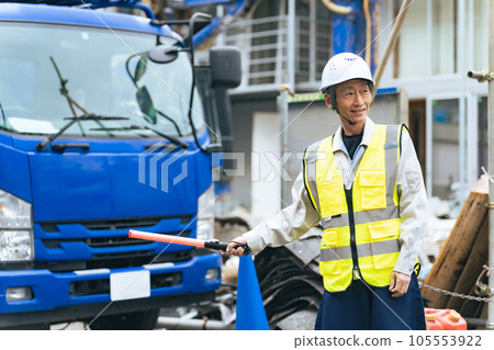 Security guard to guide traffic 105553922