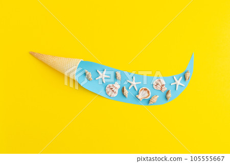 Waffle ice cream cornet with sea wave and shells inside summer concept. Waffle ice cream cornet with sea wave and shells inside summer concept. 105555667