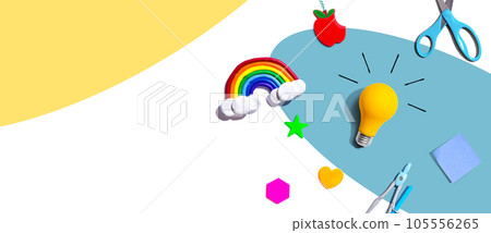 Idea light bulb with a rainbow and school supplies - flat lay Idea light bulb with a rainbow and school supplies - flat lay 105556265