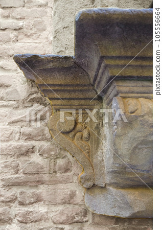 Corner of a very old stone window sill Corner of a very old stone window sill 105556664