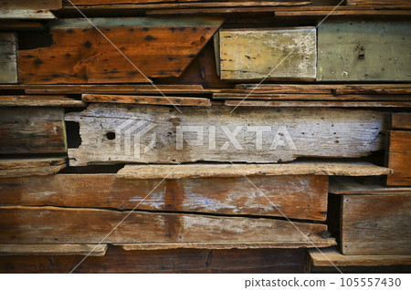 Background mix of old wooden boards of different lengths, shapes, colors, states Background mix of old wooden boards of different lengths, shapes, colors, states 105557430