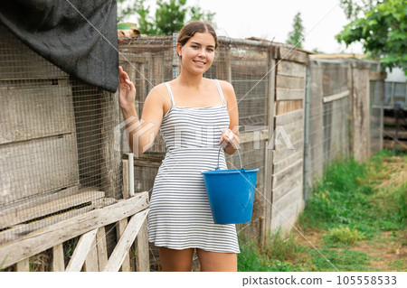 young girl at farm young girl at farm 105558533